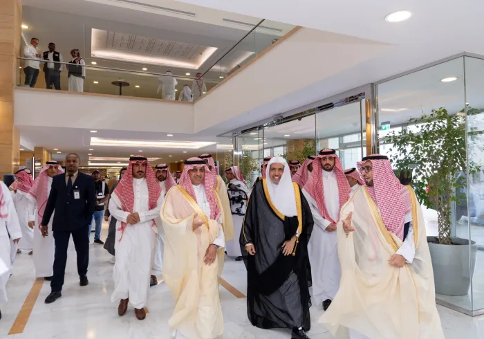 At the International Symposium hosted by the Saudi Ministry of Education, His Excellency Sheikh Dr. Mohammed Al-Issa, Secretary-General of the Muslim World League, is discussing the unique aspects of two historical charters: 